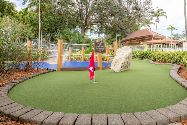1042 Bluewood Ter, Weston, FL 33327 - view of play area with a gazebo and an area to practice putting