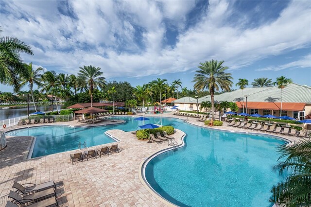 community pool with a patio