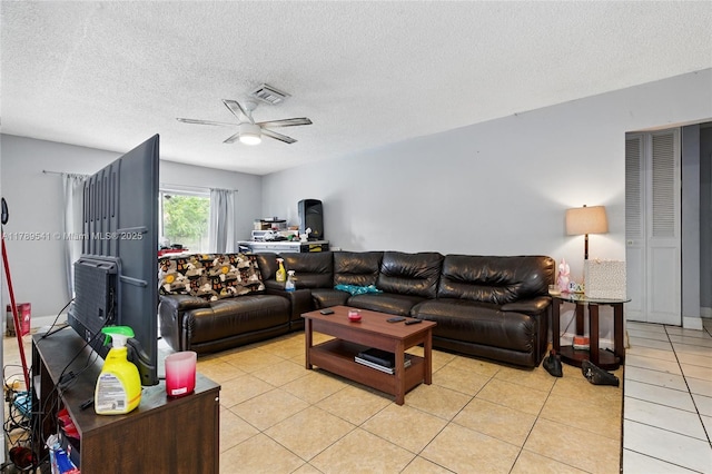 4210 NW 23rd St, Lauderhill, FL 33313 - living area featuring a ceiling fan, visible vents, a textured ceiling, and light tile patterned flooring