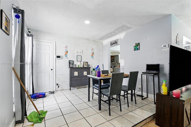 4210 NW 23rd St, Lauderhill, FL 33313 - dining space with a textured ceiling and light tile patterned floors
