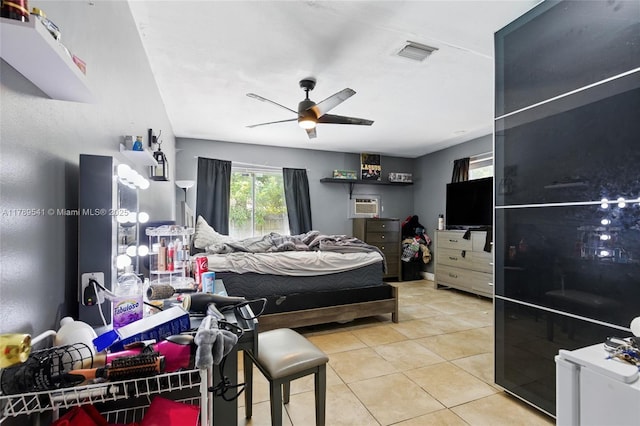 4210 NW 23rd St, Lauderhill, FL 33313 - tiled bedroom featuring ceiling fan, visible vents, and a wall unit AC