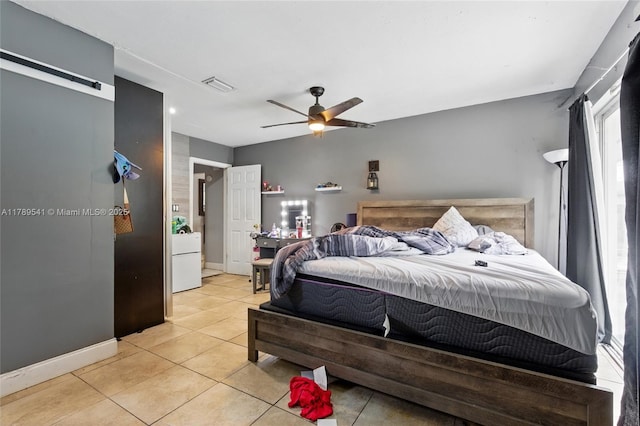4210 NW 23rd St, Lauderhill, FL 33313 - bedroom featuring ceiling fan, baseboards, visible vents, and light tile patterned floors
