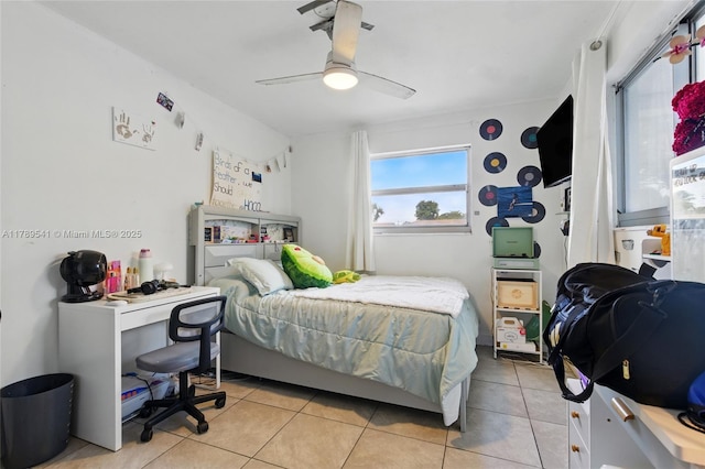 4210 NW 23rd St, Lauderhill, FL 33313 - bedroom with ceiling fan and light tile patterned floors