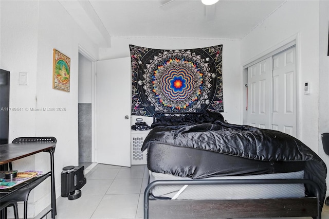 4210 NW 23rd St, Lauderhill, FL 33313 - tiled bedroom with a closet and a ceiling fan