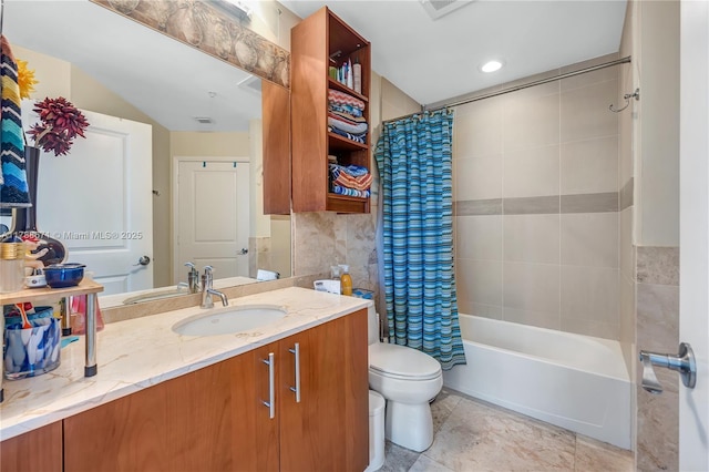 bathroom featuring tile patterned flooring, shower / tub combo, toilet, and vanity