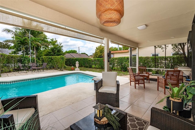 11430 NW 39th Ct, Coral Springs, FL 33065 - view of pool with a fenced in pool, a fenced backyard, and a patio