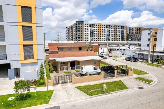 view of building exterior with a fenced front yard