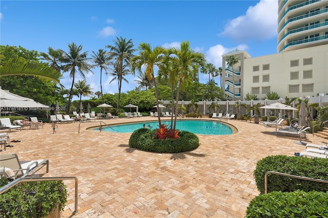 community pool with a patio