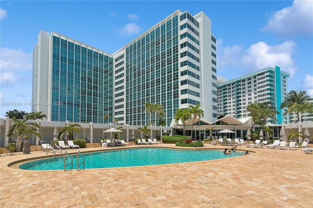 pool with a patio area