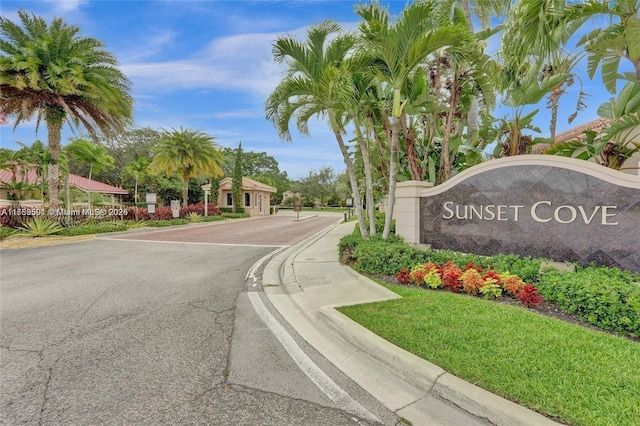 10132 NW 4th, Plantation, FL 33324 - view of road featuring a gated entry and curbs