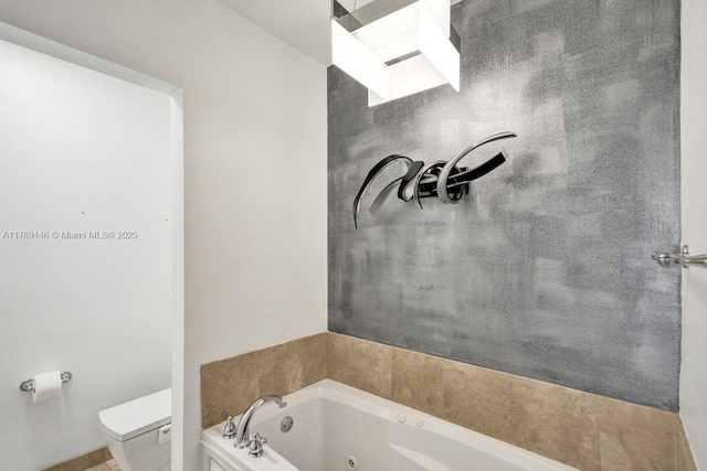 16101 Emerald Estates Dr Unit 342, Weston, FL 33331 - full bathroom featuring toilet and a jetted tub