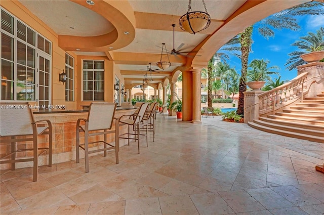 16101 Emerald Estates Dr Unit 342, Weston, FL 33331 - view of patio with an outdoor bar