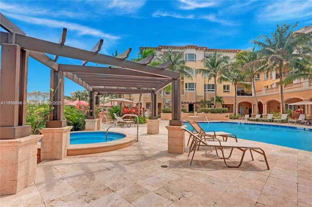 community pool with a pergola and a patio