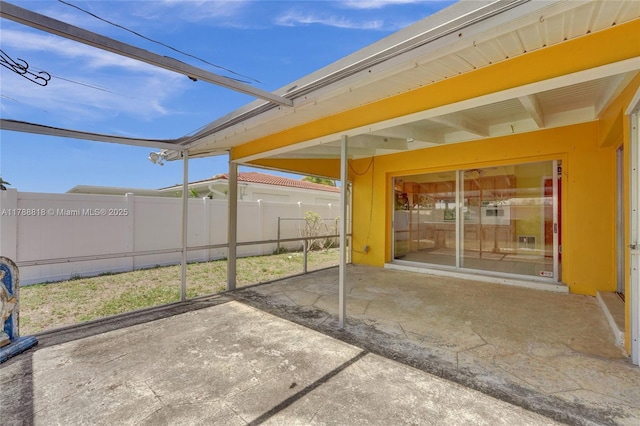 view of patio with fence