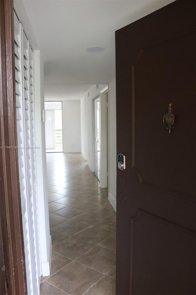 3490 Foxcroft Rd Unit B304, Miramar, FL 33025 - corridor featuring tile patterned flooring