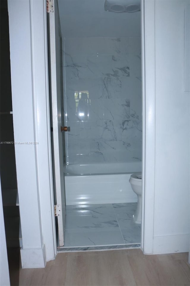 3490 Foxcroft Rd Unit B304, Miramar, FL 33025 - full bath featuring toilet,  shower combination, and marble finish flooring