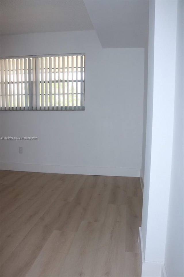3490 Foxcroft Rd Unit B304, Miramar, FL 33025 - bonus room with wood finished floors and baseboards