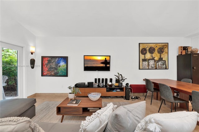3730 Kumquat Ave, Miami, FL 33133 - living room featuring baseboards