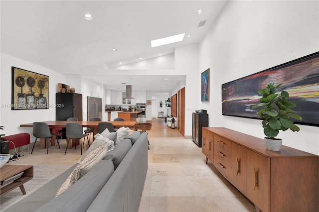 3730 Kumquat Ave, Miami, FL 33133 - living area featuring recessed lighting, vaulted ceiling with skylight, and visible vents