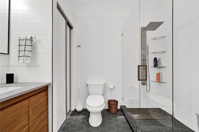 3730 Kumquat Ave, Miami, FL 33133 - bathroom featuring tile patterned floors, a shower stall, and toilet