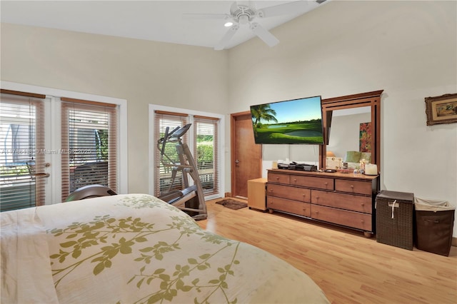 3730 Kumquat Ave, Miami, FL 33133 - bedroom featuring light wood-type flooring, a high ceiling, ceiling fan, and access to exterior