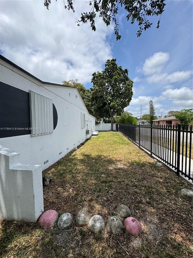 view of yard with fence