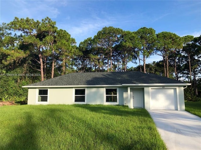 ranch-style home featuring driveway, a front yard, stucco siding, and a garage