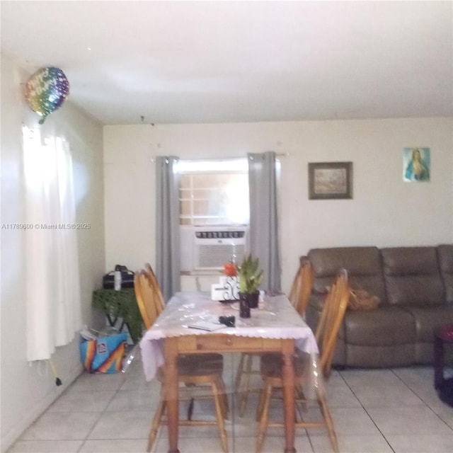 dining room with light tile patterned flooring and cooling unit