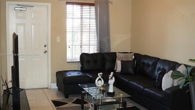 living area with light tile patterned floors