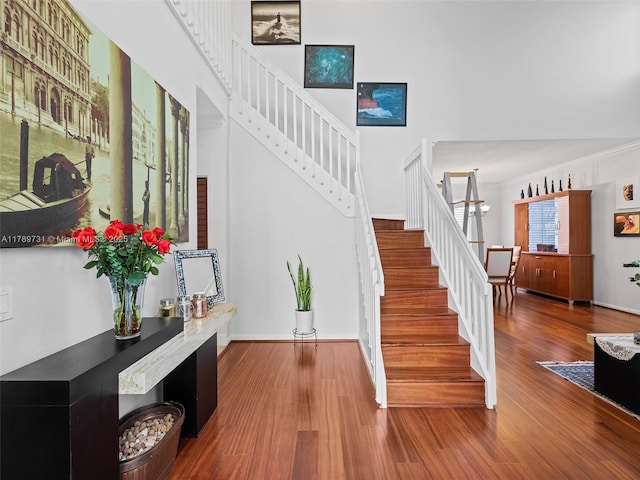 1206 Falls Blvd, Weston, FL 33327 - stairway with wood finished floors and baseboards