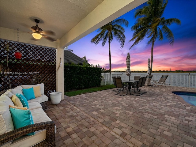 1206 Falls Blvd, Weston, FL 33327 - fenced backyard featuring an outdoor living space, a ceiling fan, a patio, and outdoor dining area