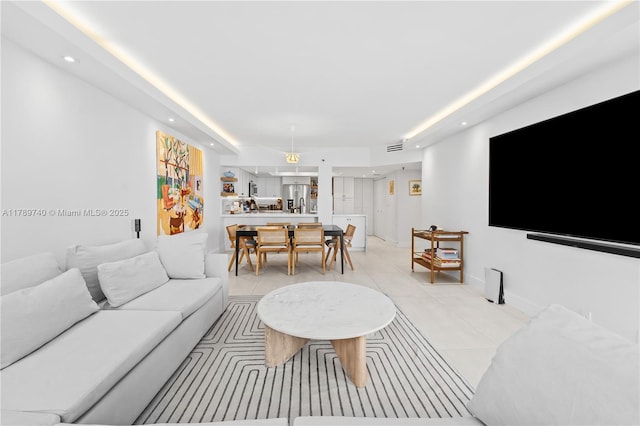 520 Brickell Key Dr Unit A713, Miami, FL 33131 - living room with light tile patterned floors and recessed lighting