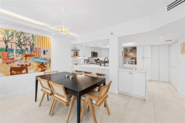 520 Brickell Key Dr Unit A713, Miami, FL 33131 - dining space featuring light tile patterned floors