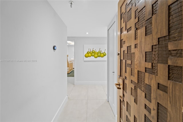 520 Brickell Key Dr Unit A713, Miami, FL 33131 - hall featuring baseboards and light tile patterned floors