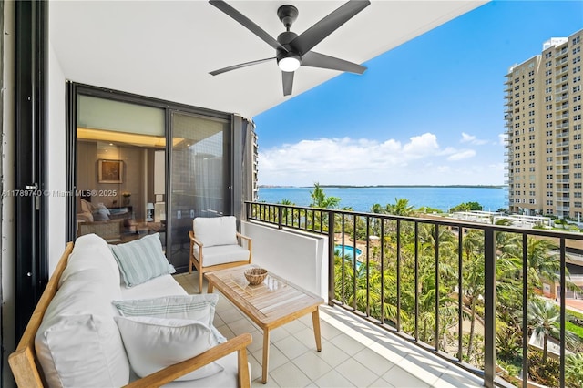 520 Brickell Key Dr Unit A713, Miami, FL 33131 - balcony with a water view, ceiling fan, and an outdoor hangout area
