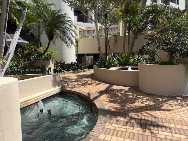 520 Brickell Key Dr Unit A713, Miami, FL 33131 - view of home's community with a jacuzzi