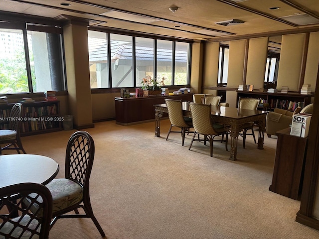 520 Brickell Key Dr Unit A713, Miami, FL 33131 - dining space featuring light carpet and plenty of natural light