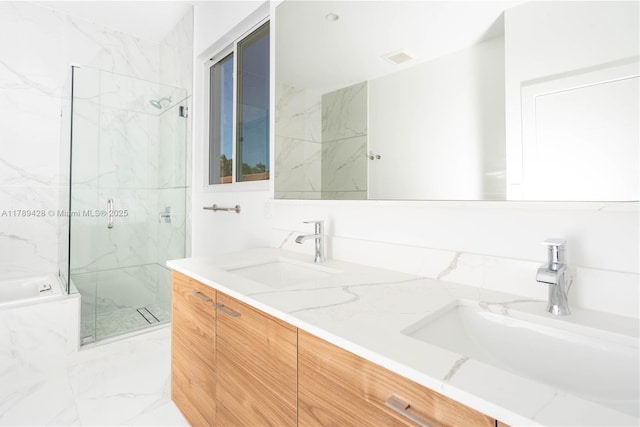 900 SW 24th Rd, Miami, FL 33129 - bathroom with a sink, a marble finish shower, double vanity, and marble finish floor