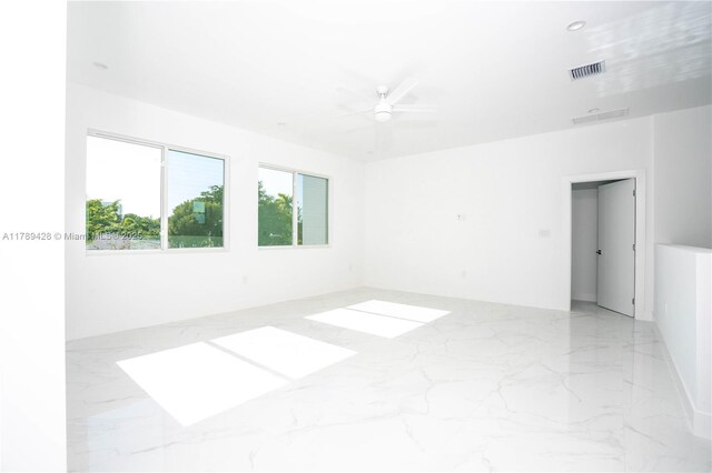 900 SW 24th Rd, Miami, FL 33129 - spare room featuring a ceiling fan, marble finish floor, and visible vents