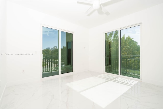 900 SW 24th Rd, Miami, FL 33129 - unfurnished room featuring ceiling fan, baseboards, and marble finish floor