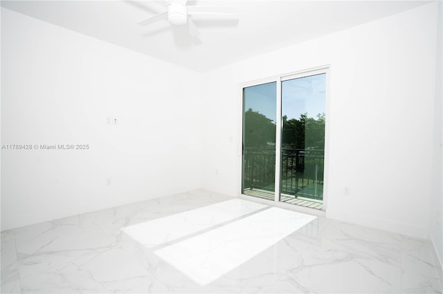 900 SW 24th Rd, Miami, FL 33129 - empty room featuring a ceiling fan and marble finish floor