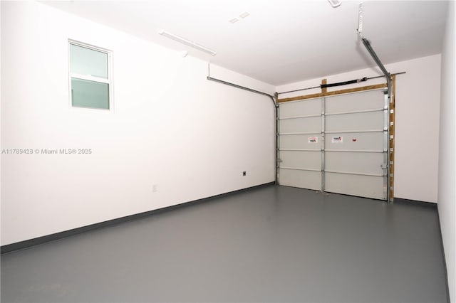 900 SW 24th Rd, Miami, FL 33129 - garage featuring baseboards