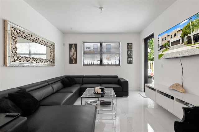 living area featuring light tile patterned floors