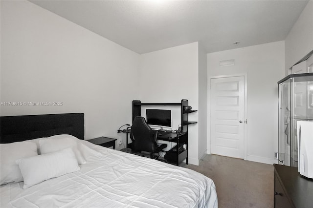 bedroom featuring baseboards, carpet flooring, and visible vents