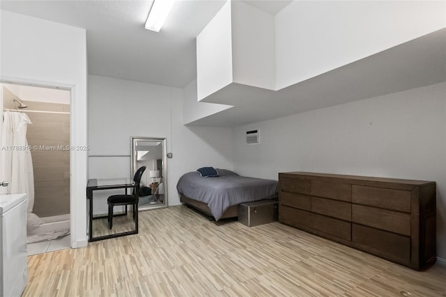 bedroom with light wood-type flooring