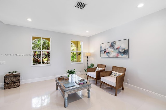 sitting room with baseboards, visible vents, and recessed lighting