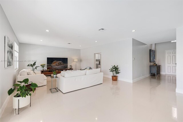1092 Lavender Cir, Weston, FL 33327 - tiled living area featuring visible vents, baseboards, and recessed lighting