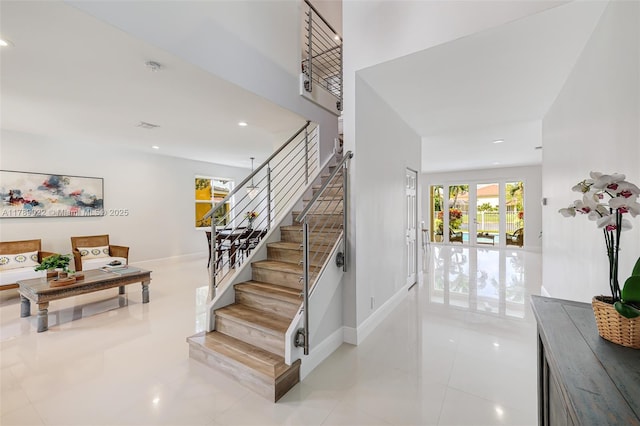 1092 Lavender Cir, Weston, FL 33327 - stairway featuring tile patterned floors, baseboards, and recessed lighting