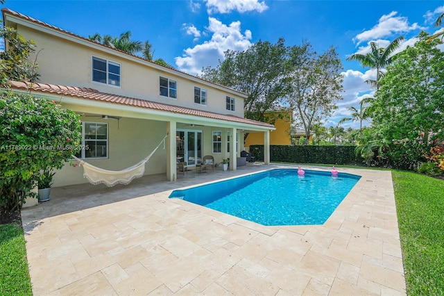 1092 Lavender Cir, Weston, FL 33327 - view of swimming pool featuring a fenced backyard, a patio area, a fenced in pool, and a ceiling fan