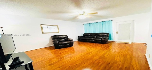 497 W Tilford W Unit W, Deerfield Beach, FL 33442 - living room with ceiling fan, wood finished floors, and a textured ceiling
